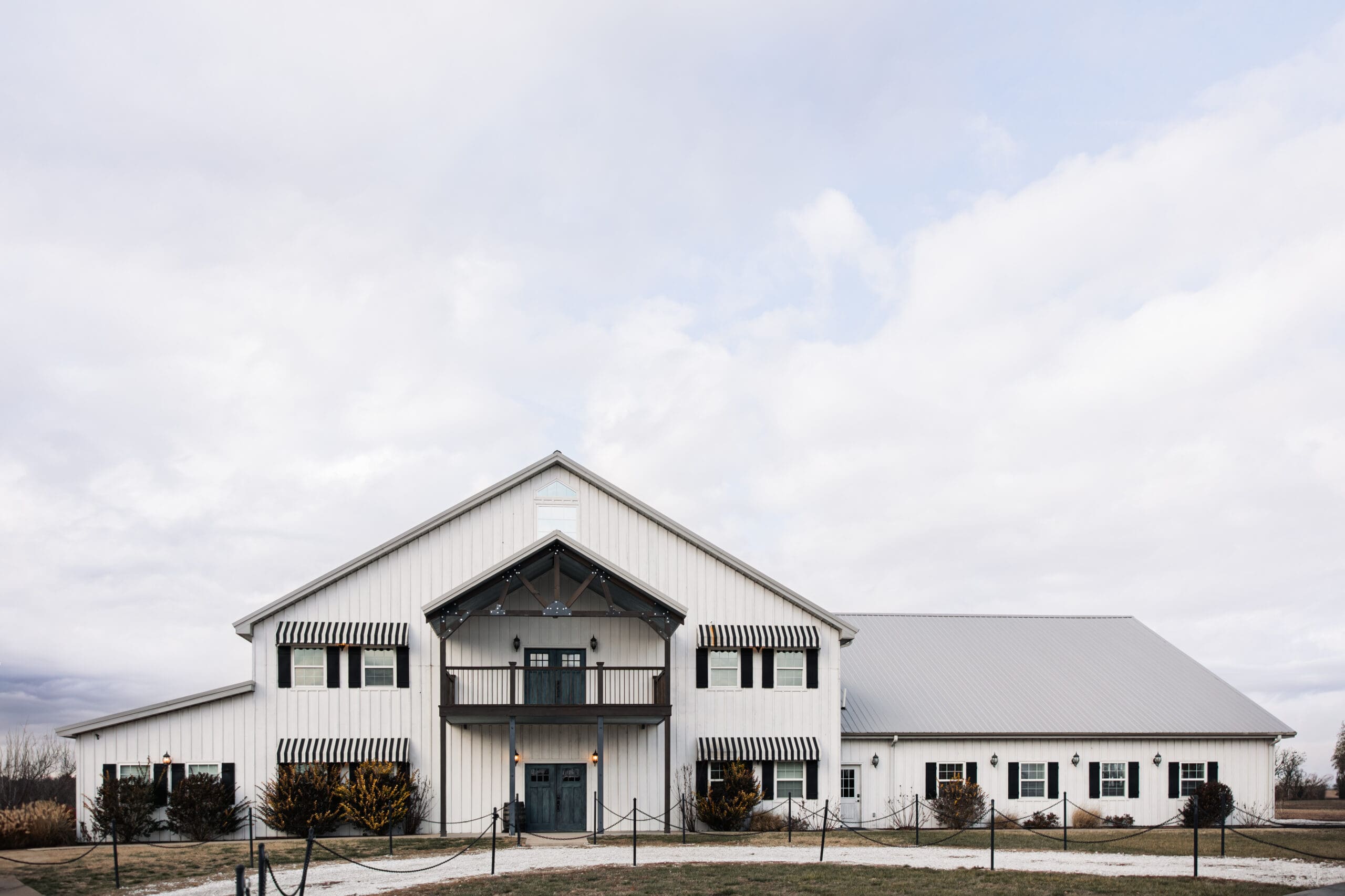 Exterior of The Silver Spoon Barn in Joplin, MO decorated for a winter wedding
