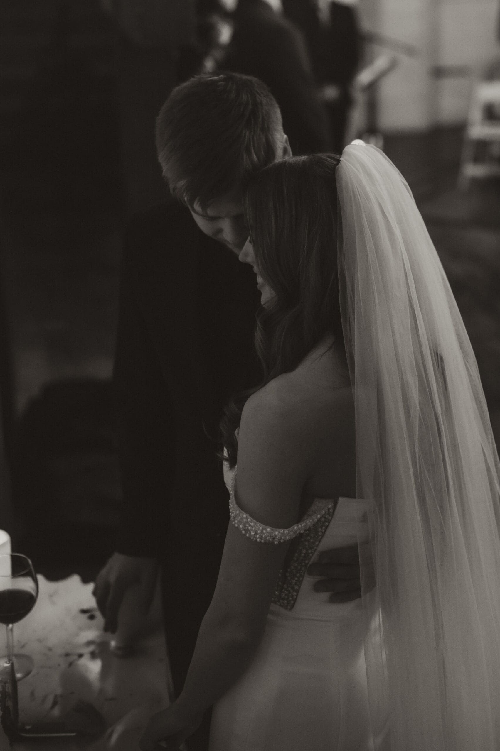 Candid wedding moment at The Silver Spoon Barn in Joplin during winter