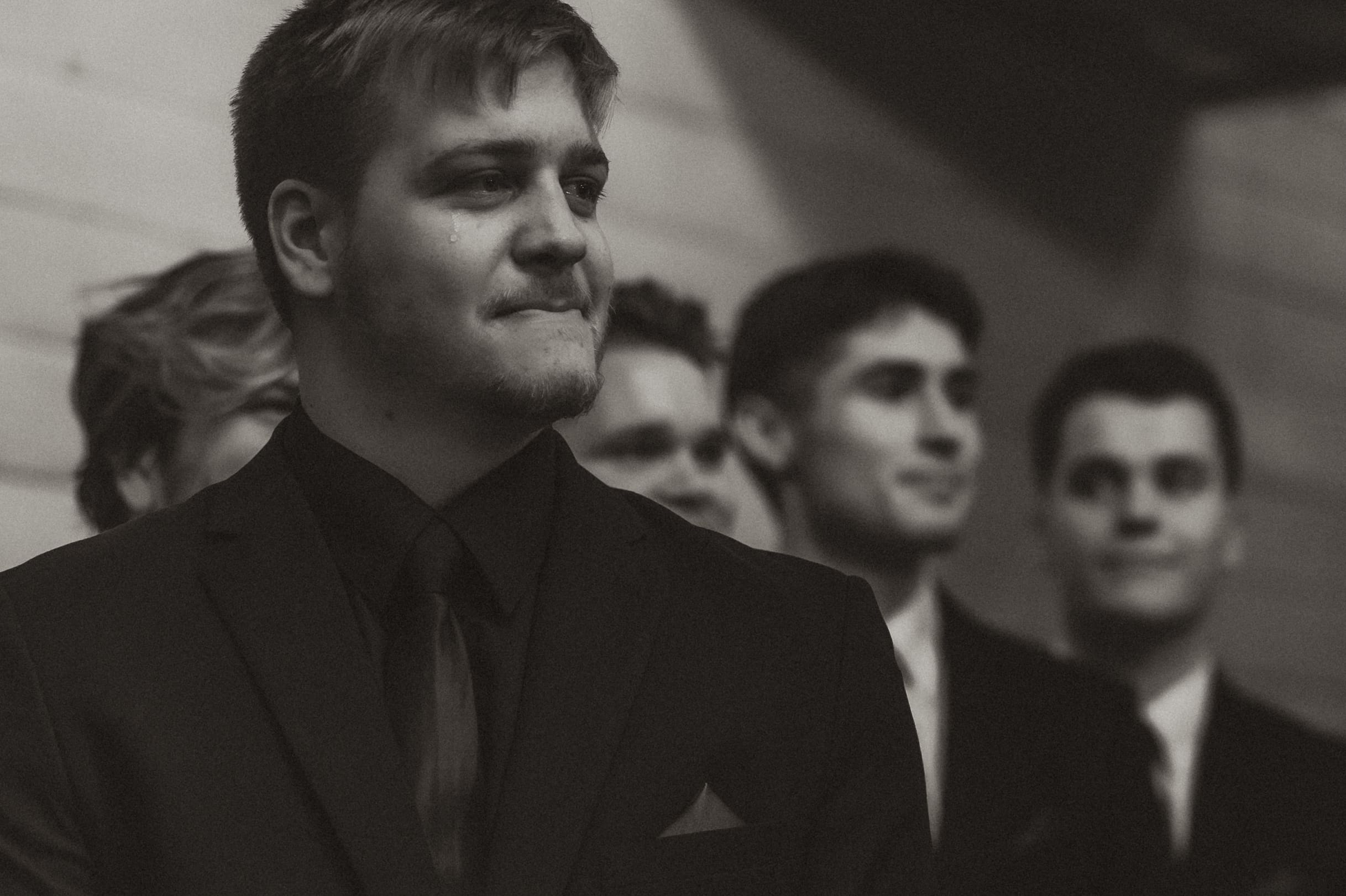Groom emotional as bride walks down the aisle during winter wedding at The Silver Spoon Barn