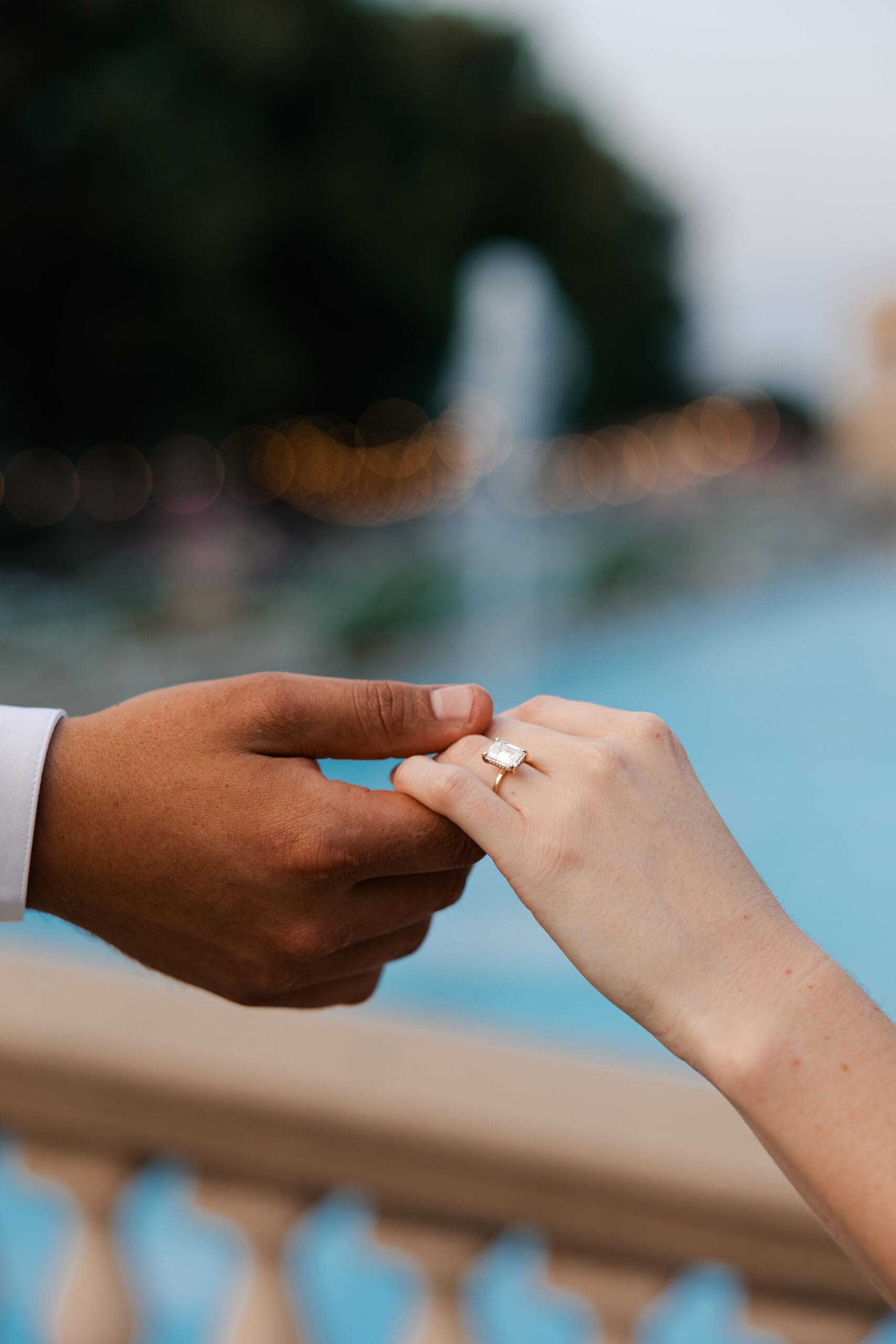 Close-up of engagement ring on floral background at Unity Village