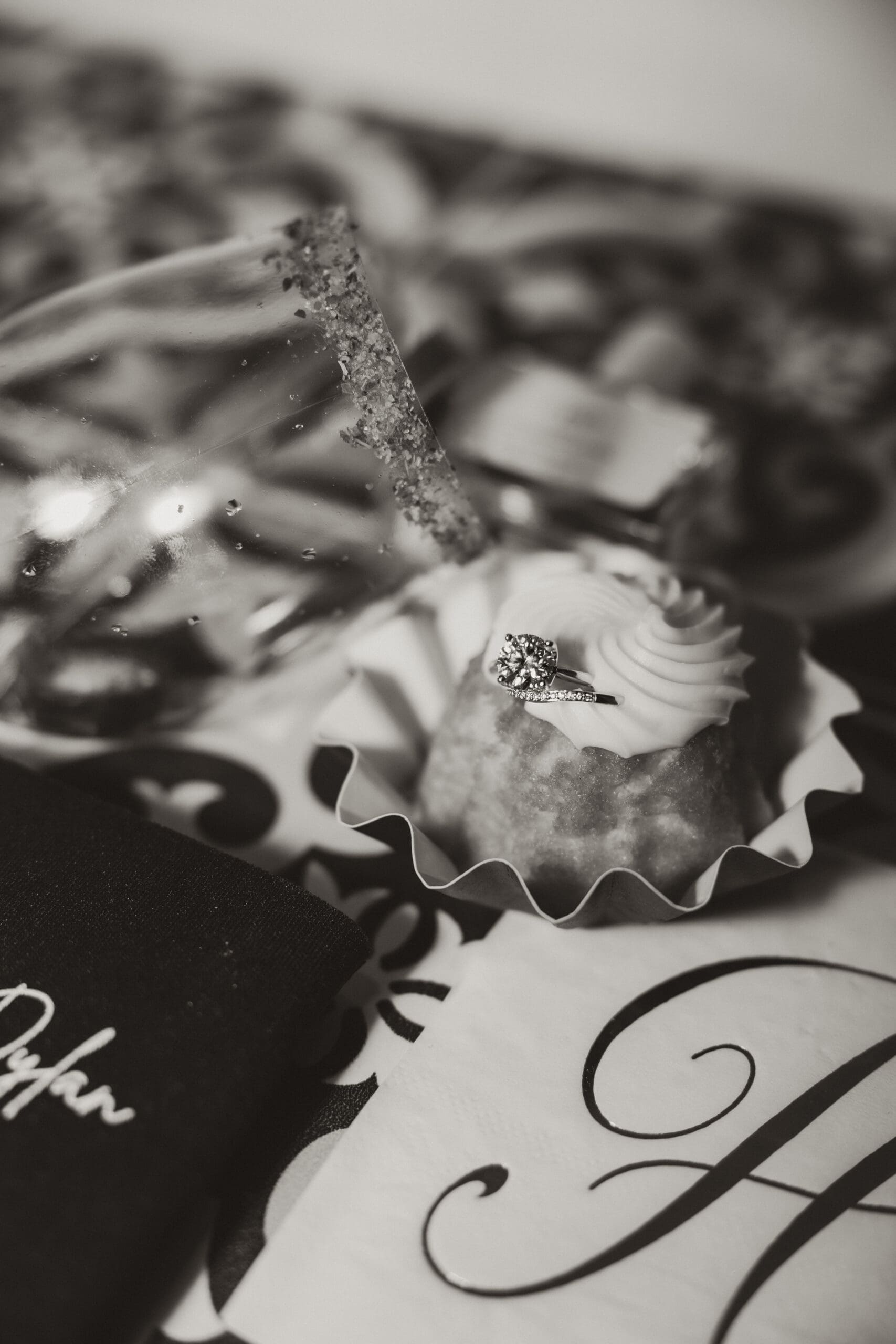 Reception flat lay of bride’s rings with bundt cake Barn at Grace Hill.