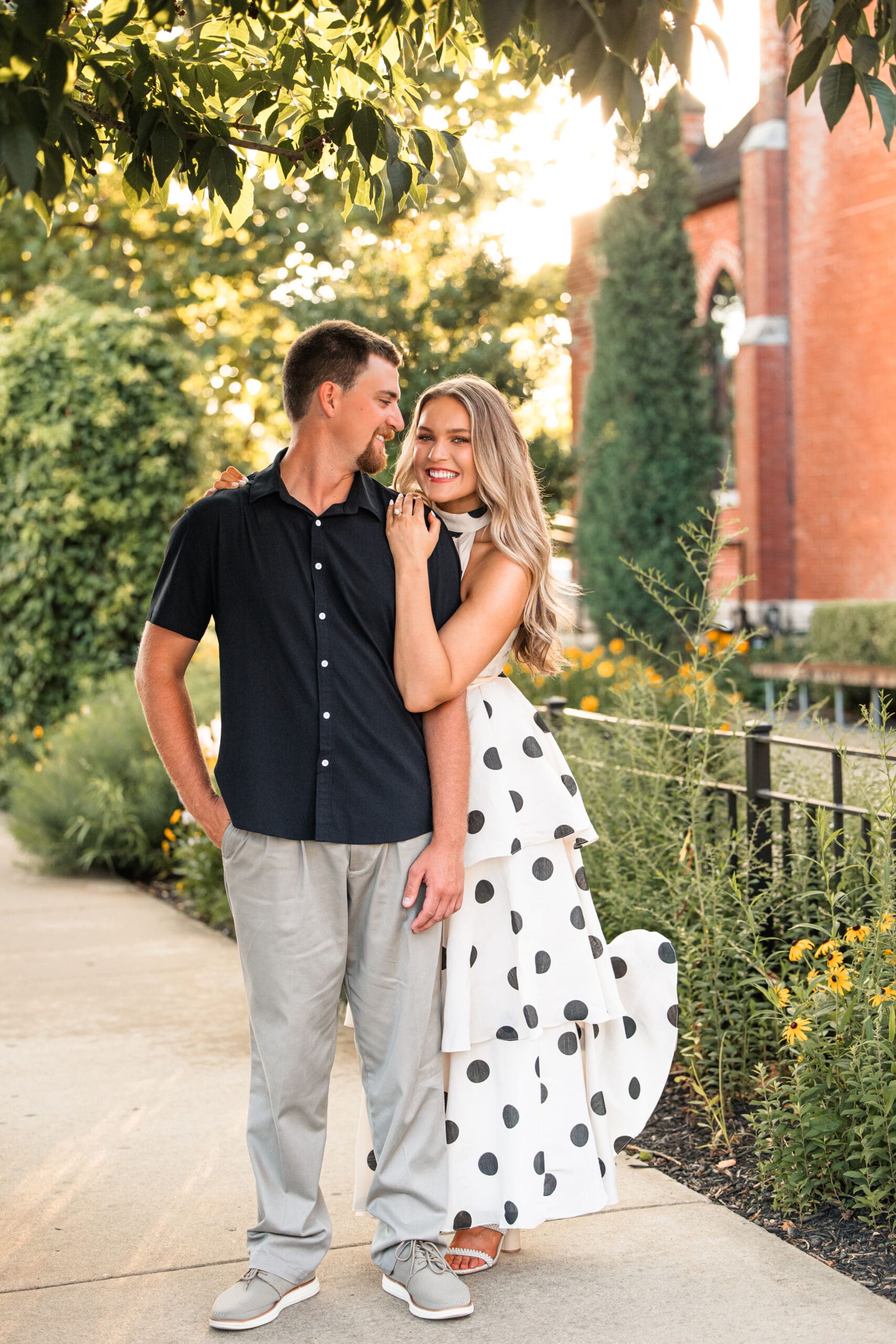 Wide shot of couple from above, showing romantic connection. Wichita Wedding Photographer