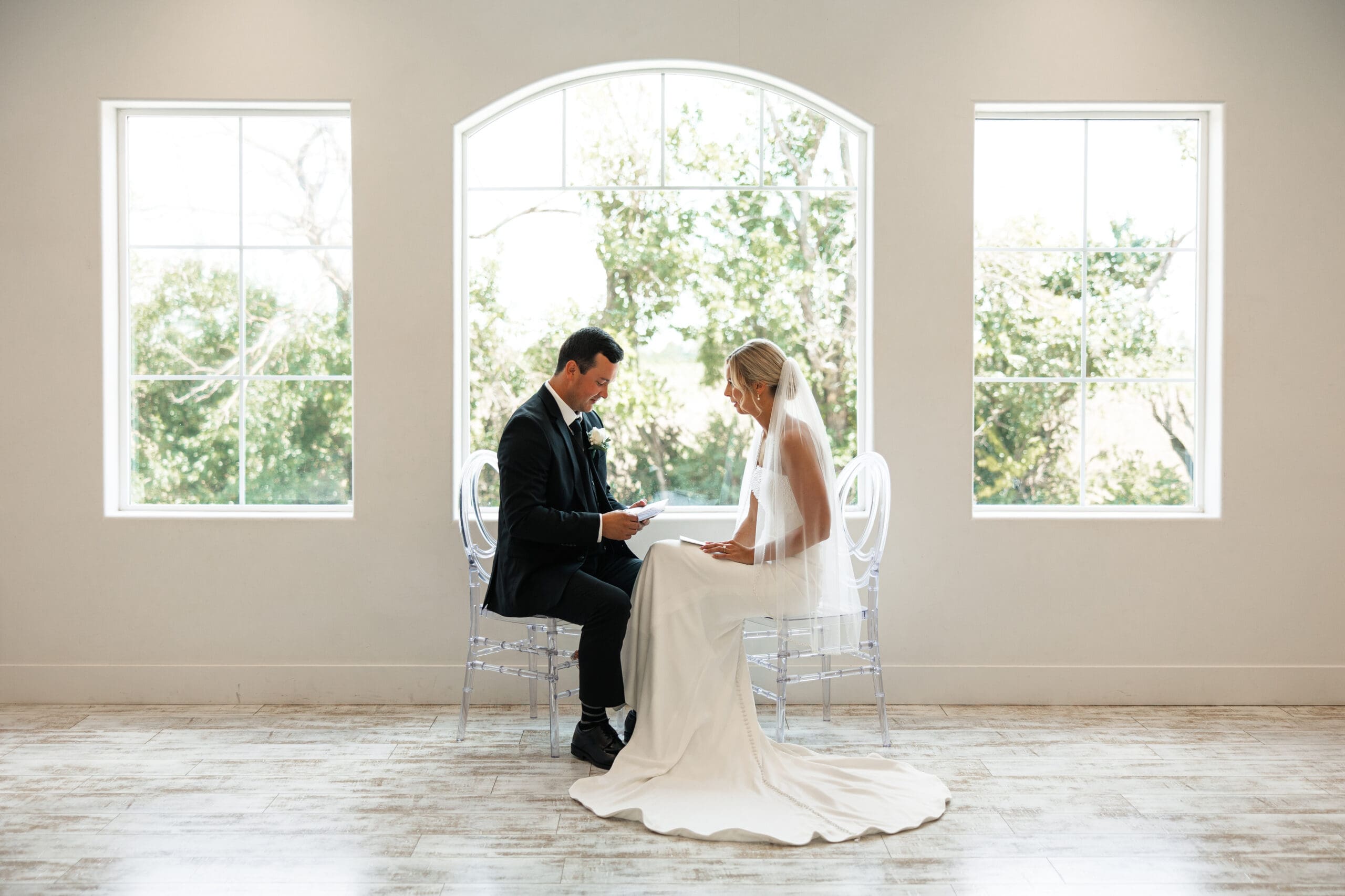Bride and groom reading vows Barn at Grace Hill wedding.