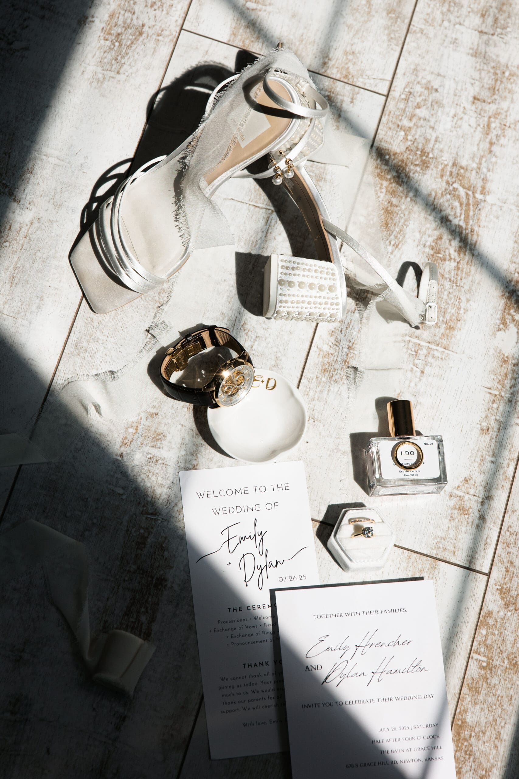 Flat lay of bride and groom details.