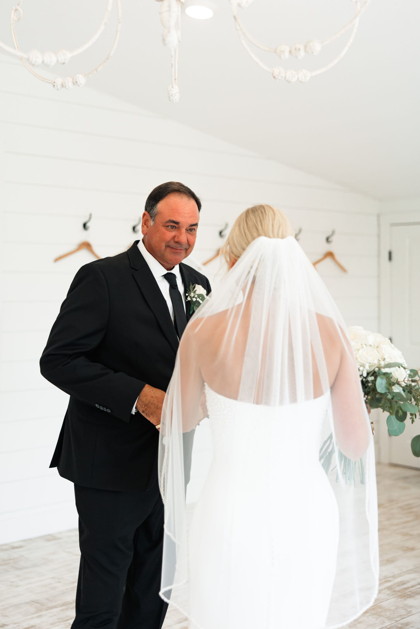 Intimate moment of bride’s father seeing her Barn at Grace Hill.