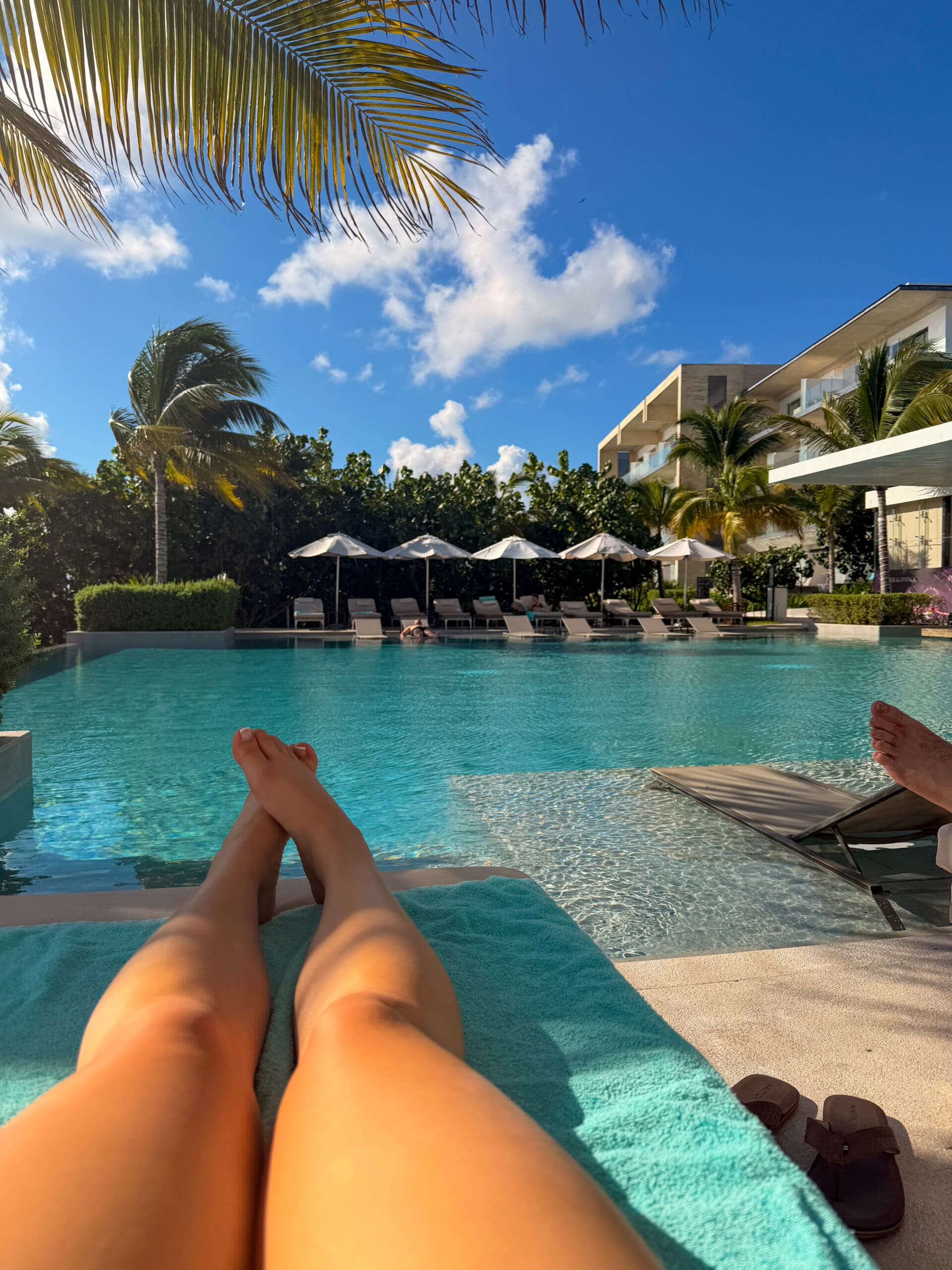 Lounging by the Serenity Club pool at Haven Riviera Cancun