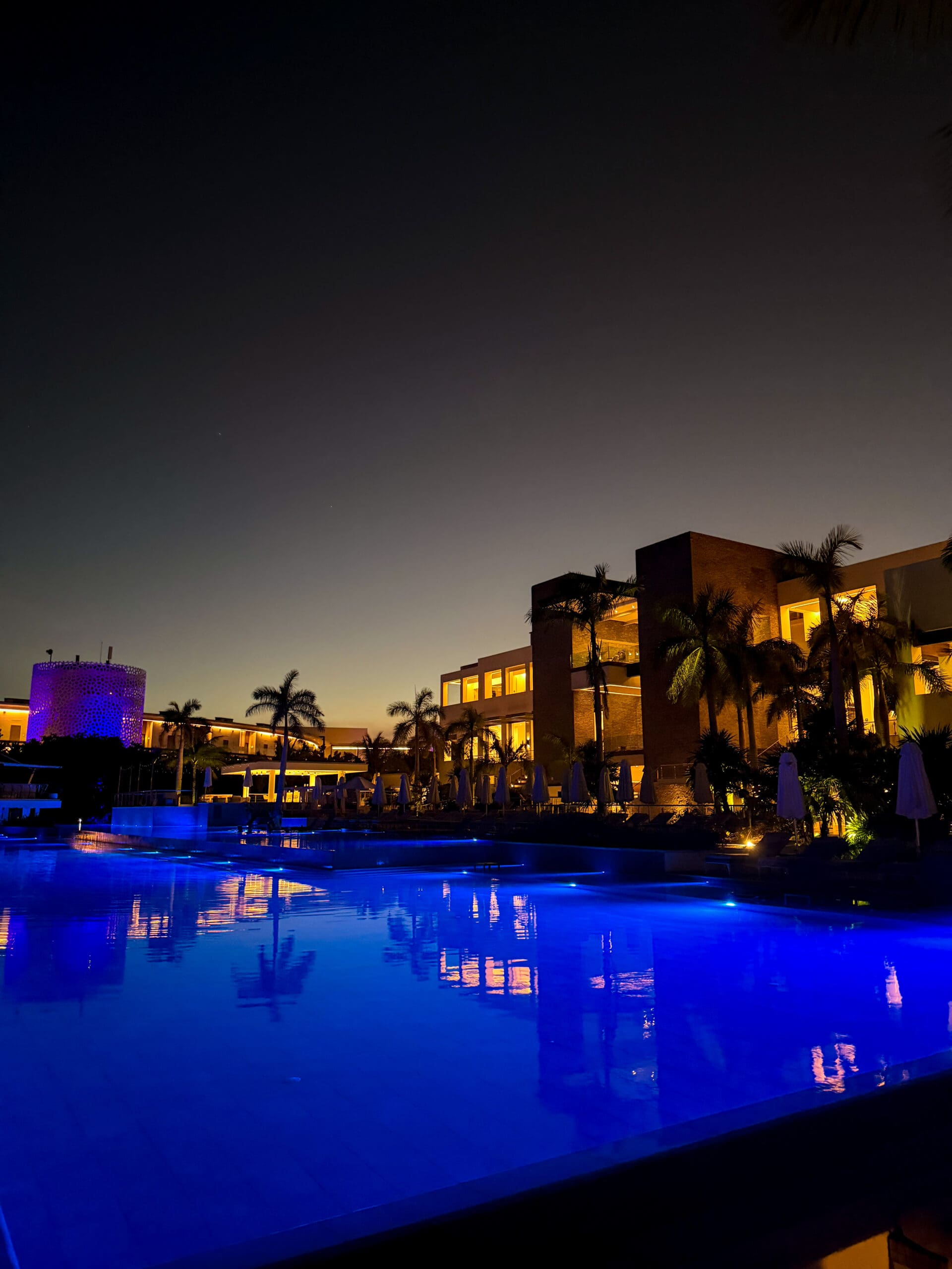 Haven Riviera Cancun honeymoon main pool lit up beautifully at night