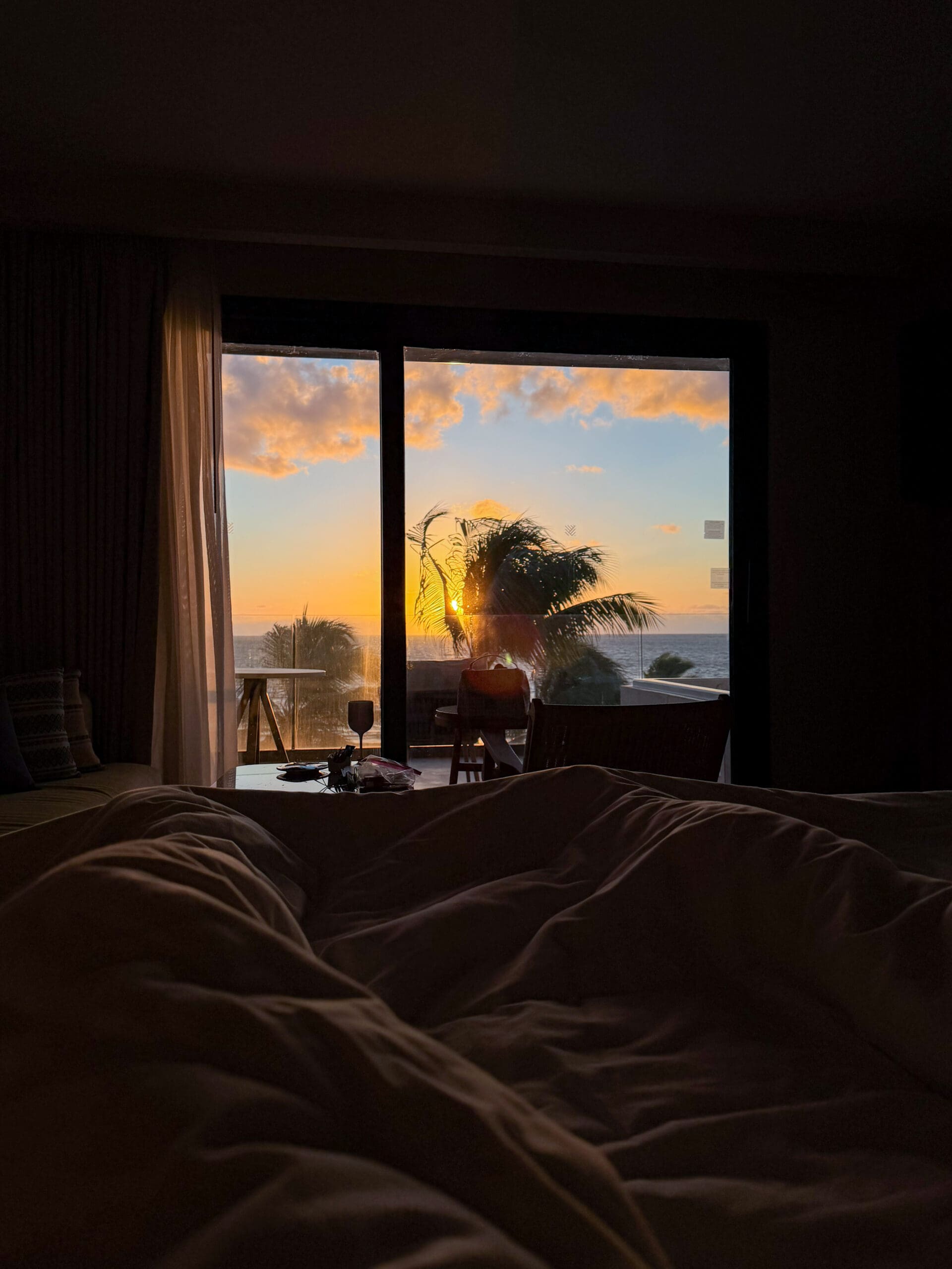 Sunrise over the ocean from our oceanfront suite at Haven Riviera Cancun honeymoon