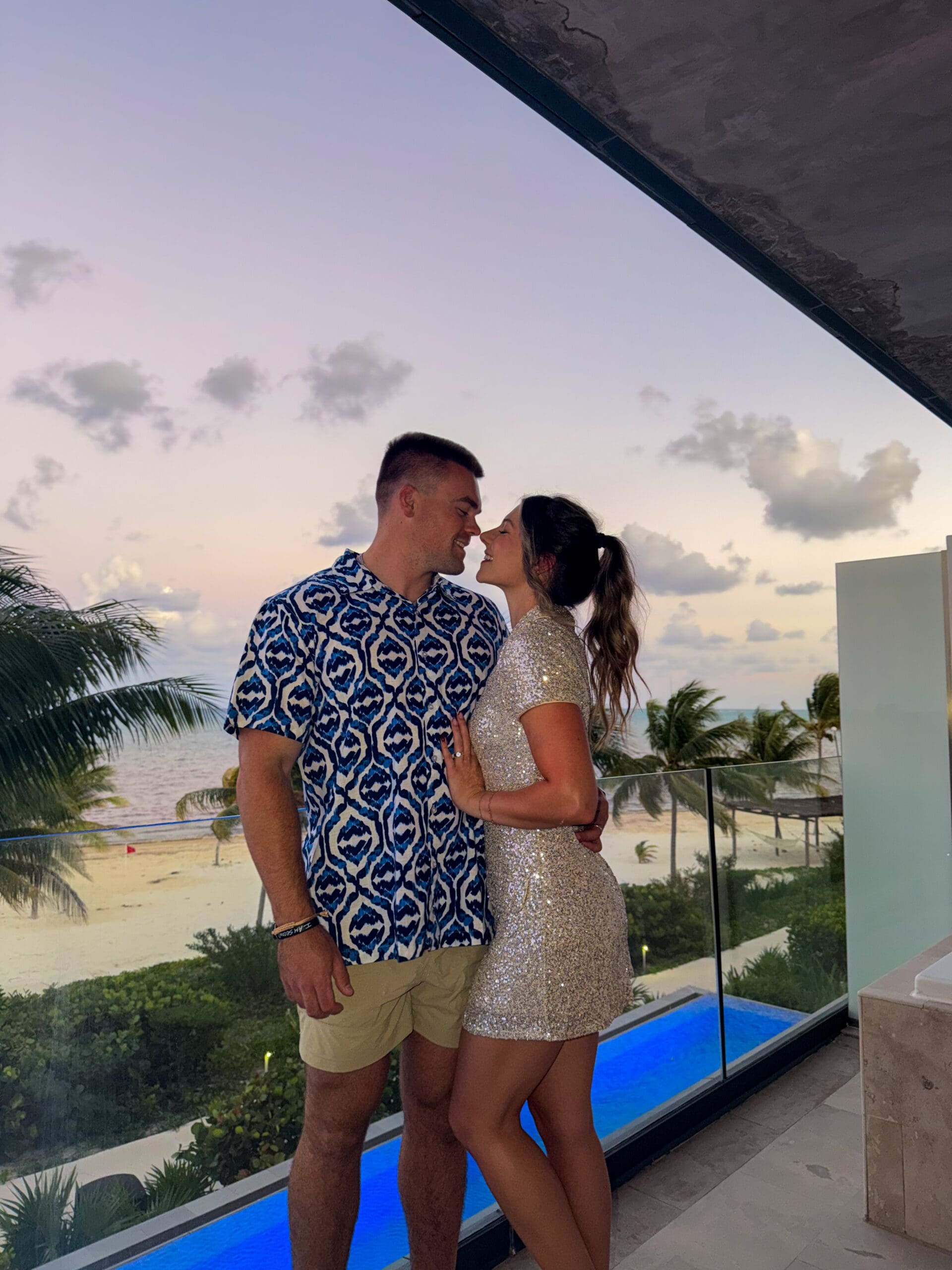 Smiling after getting ready for dinner on balcony at Haven Riviera Cancun