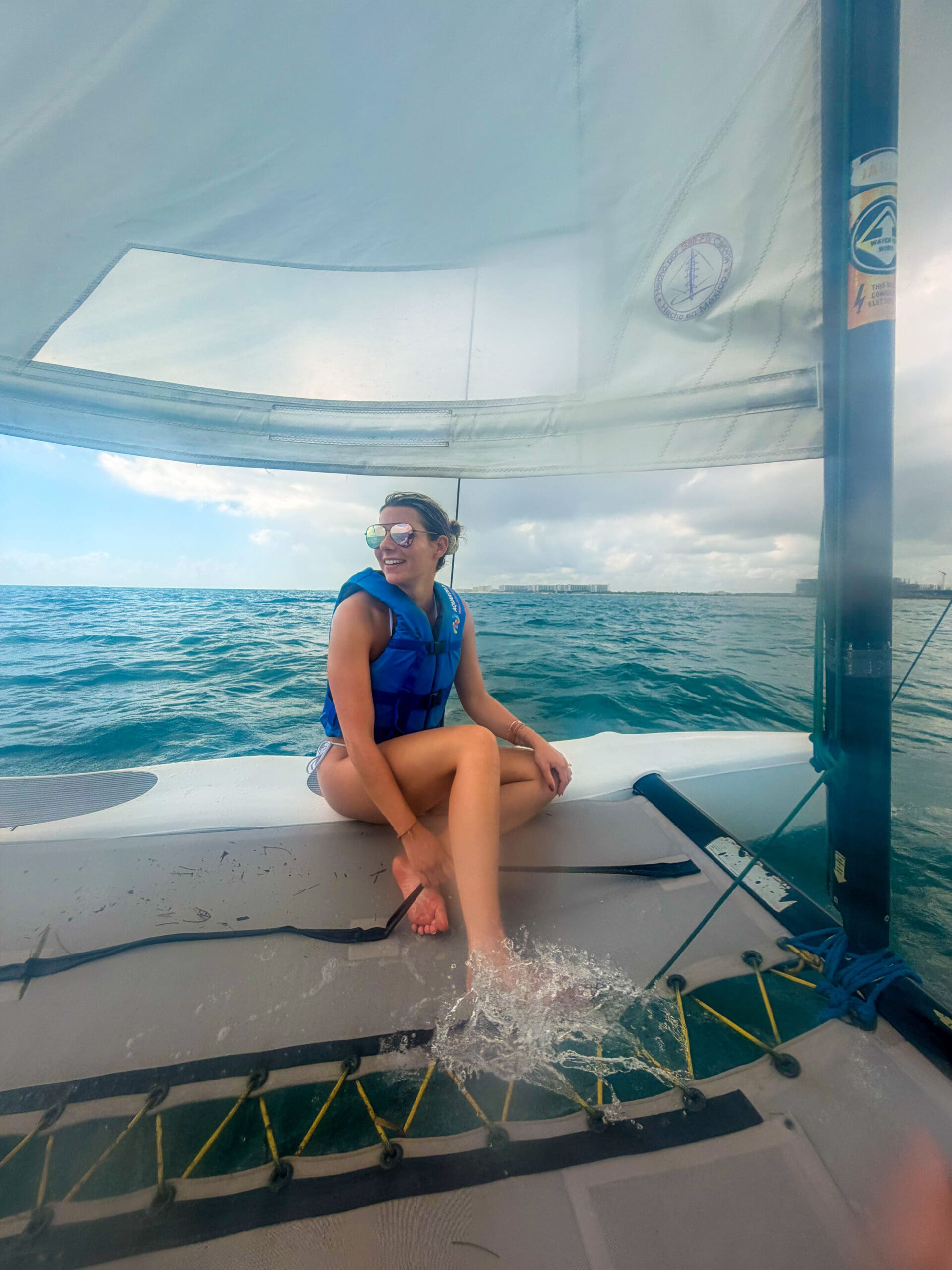 Sailing the Hobie Cat from AquaWorld during our Haven Riviera Cancun honeymoon
