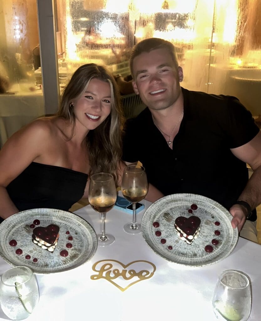 Smiling with specialty desserts at romantic Serenity Club dinner