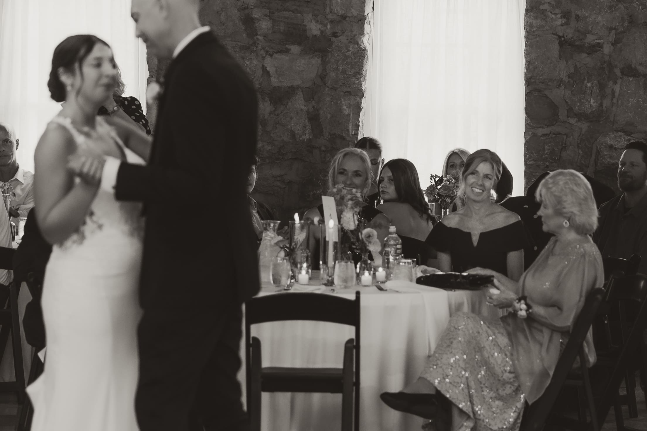 Bride and her father share a touching first dance at Stone Manor on 79th, surrounded by guests and candlelight.