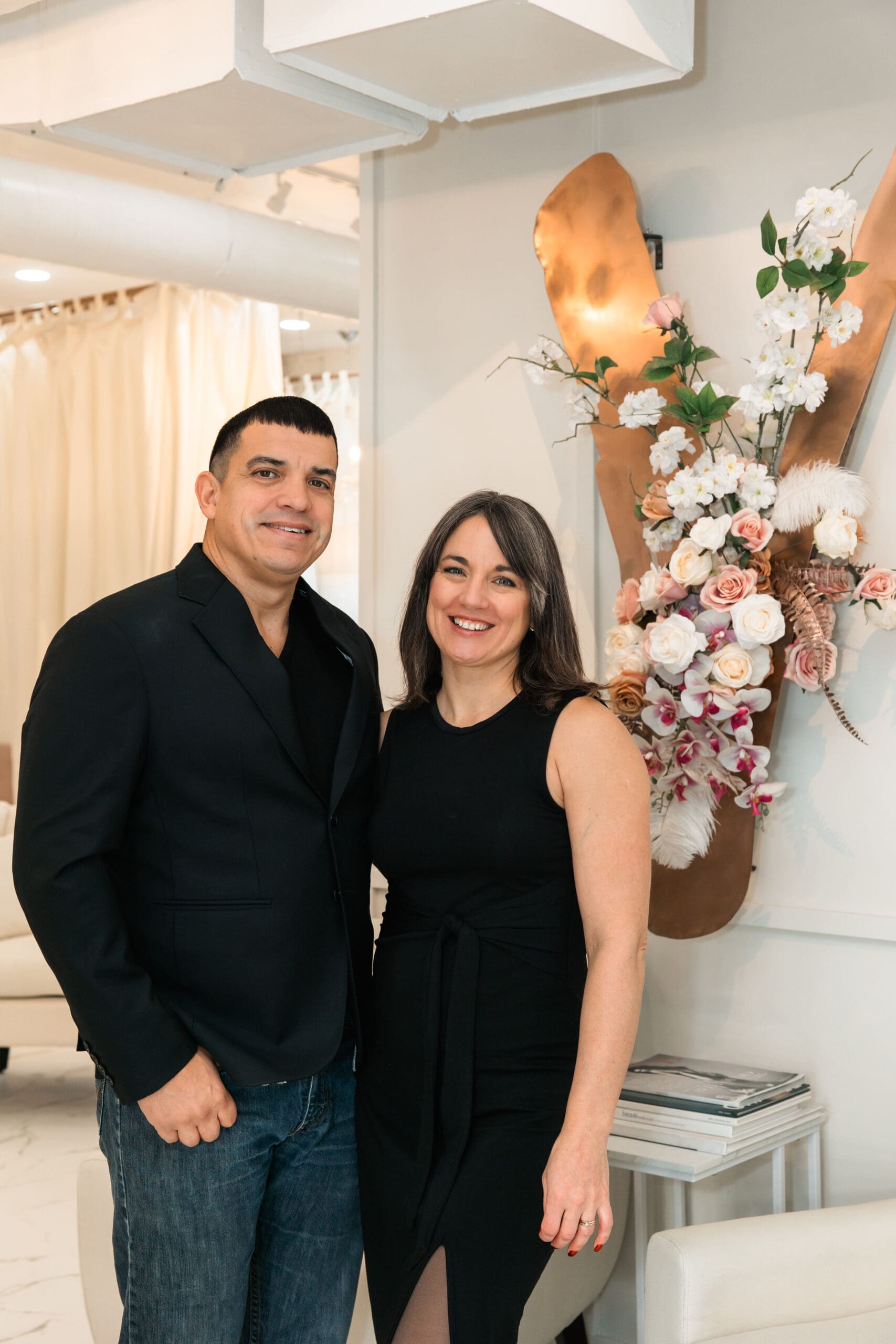 Vanya Designs owners smiling in their Wichita custom wedding dress atelier studio