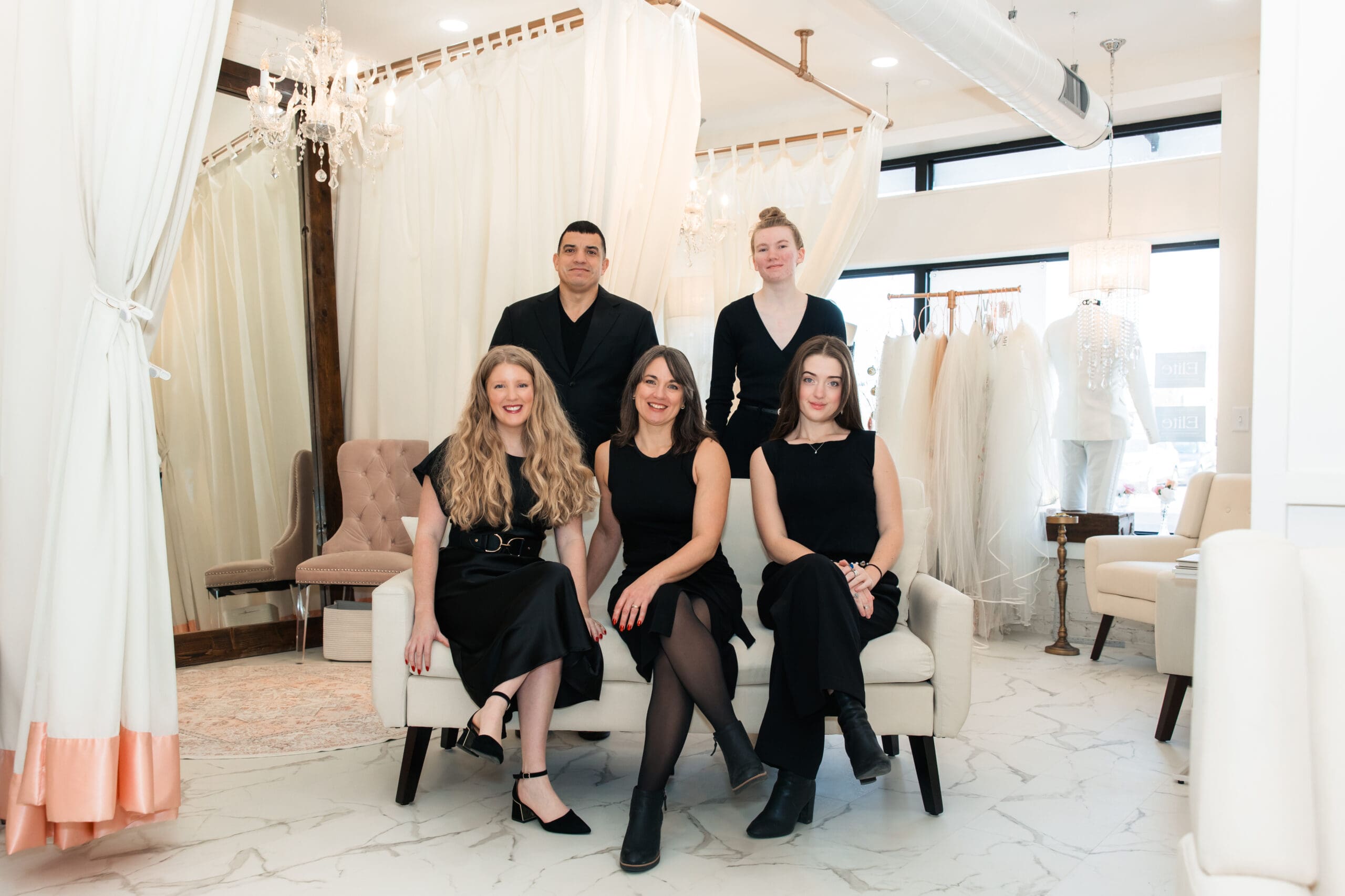 The Vanya Designs team in their Wichita custom wedding dress boutique, Downtown Wichita
