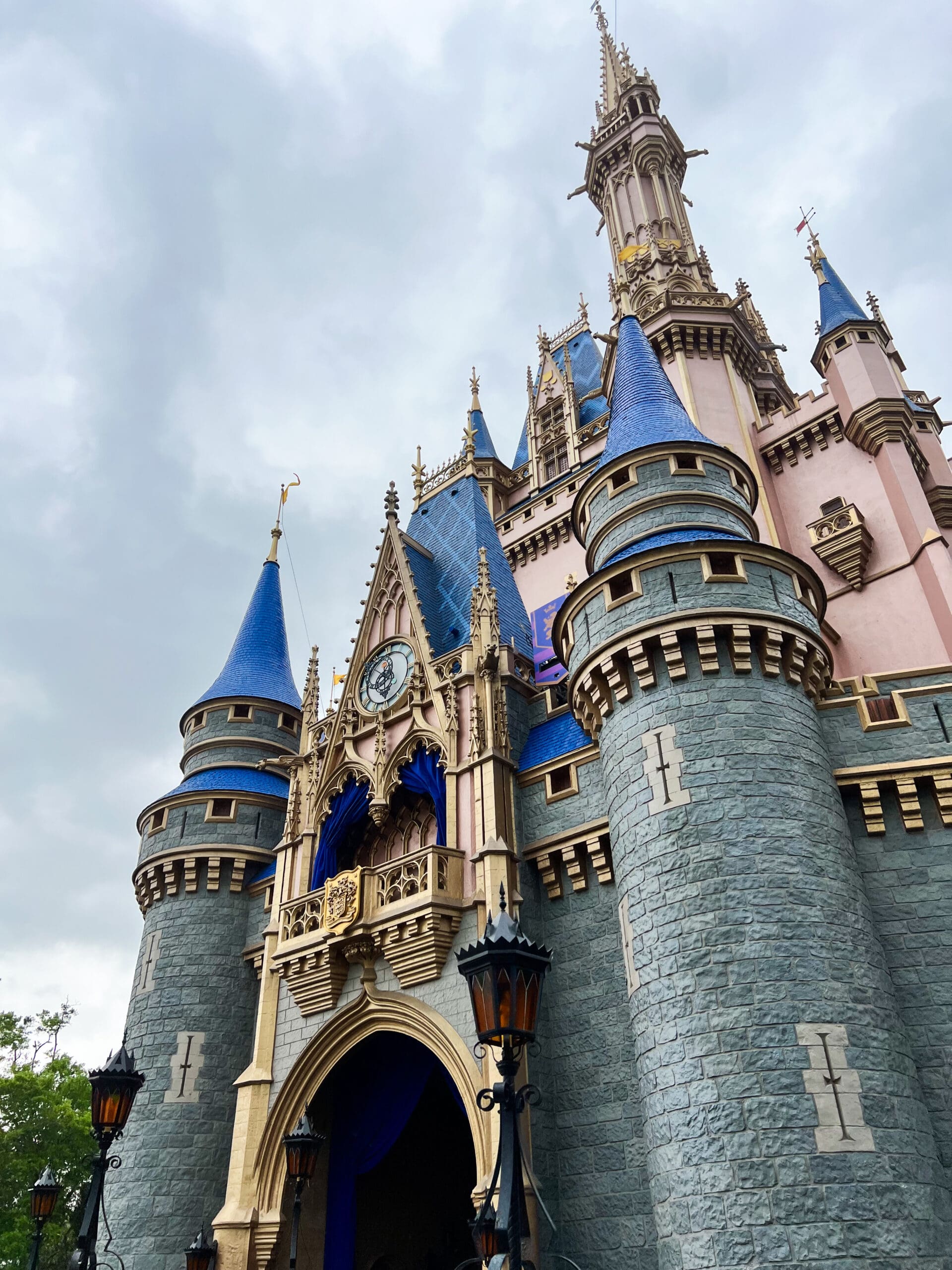 Detailed view of Cinderella Castle turrets and blue accents at Magic Kingdom Disney World – iconic symbol of Disney magic during Orlando adventure
